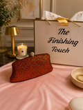 Red diamanté clutch bag