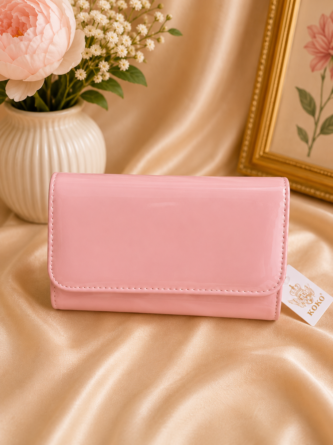 Pink patent envelope clutch