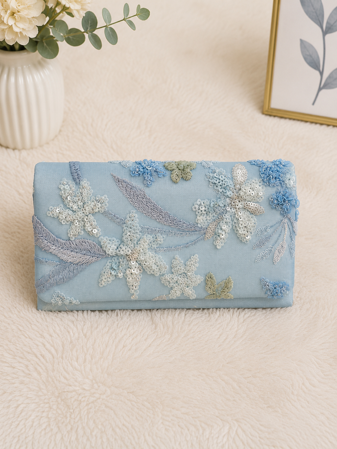 Ice petal sequin clutch