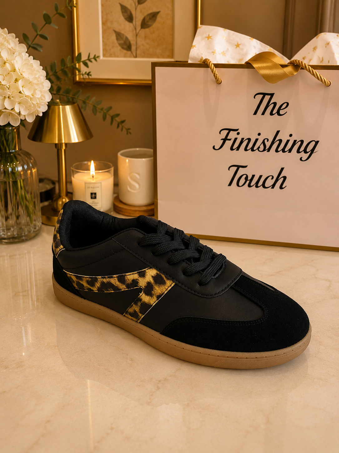 Black animal print trainers