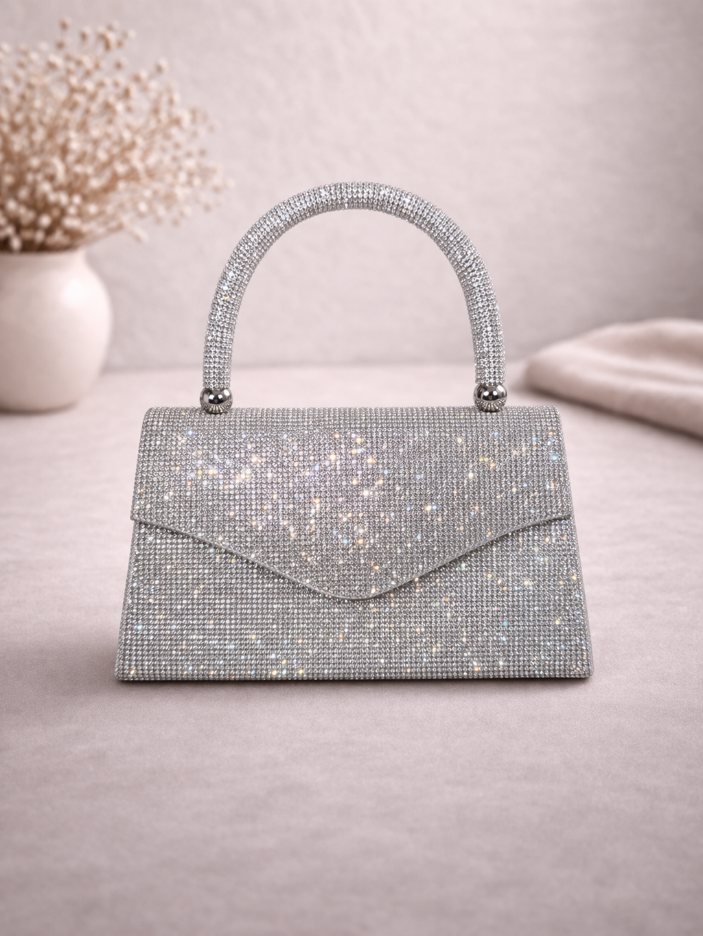 Rhinestone detailed clutch handbag