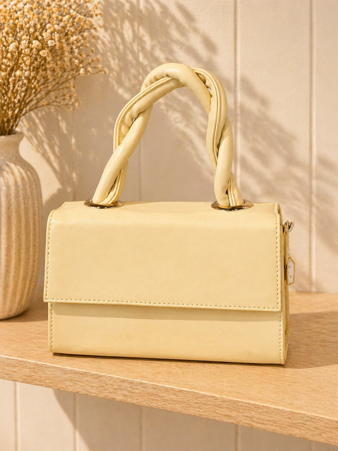Twist handle mini bag