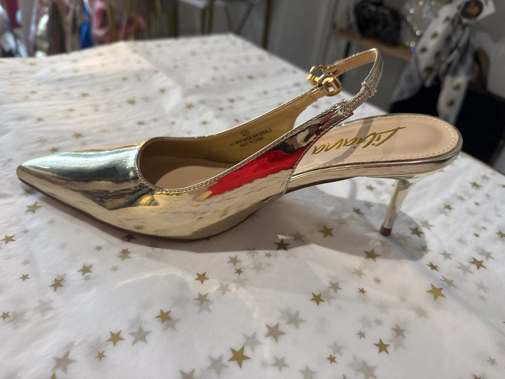 Gold slingback kitten heel.