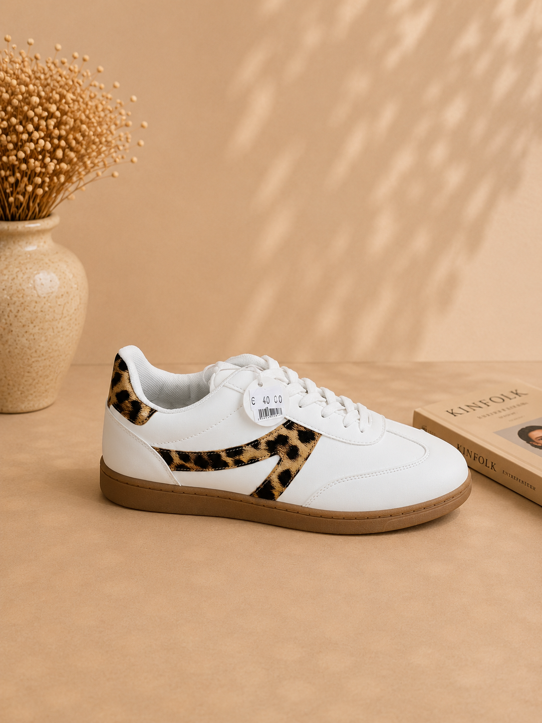 White trainer with leopard print detail