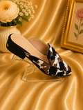 Cow print slip on loafer