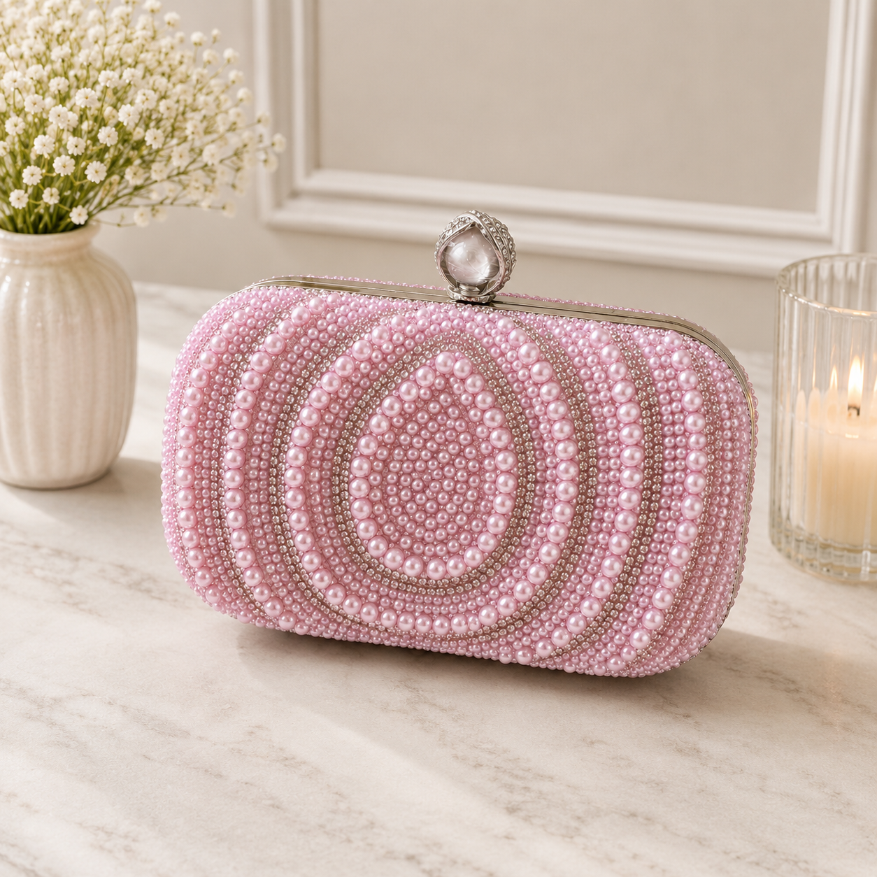 Pink pearl detail clutch bag