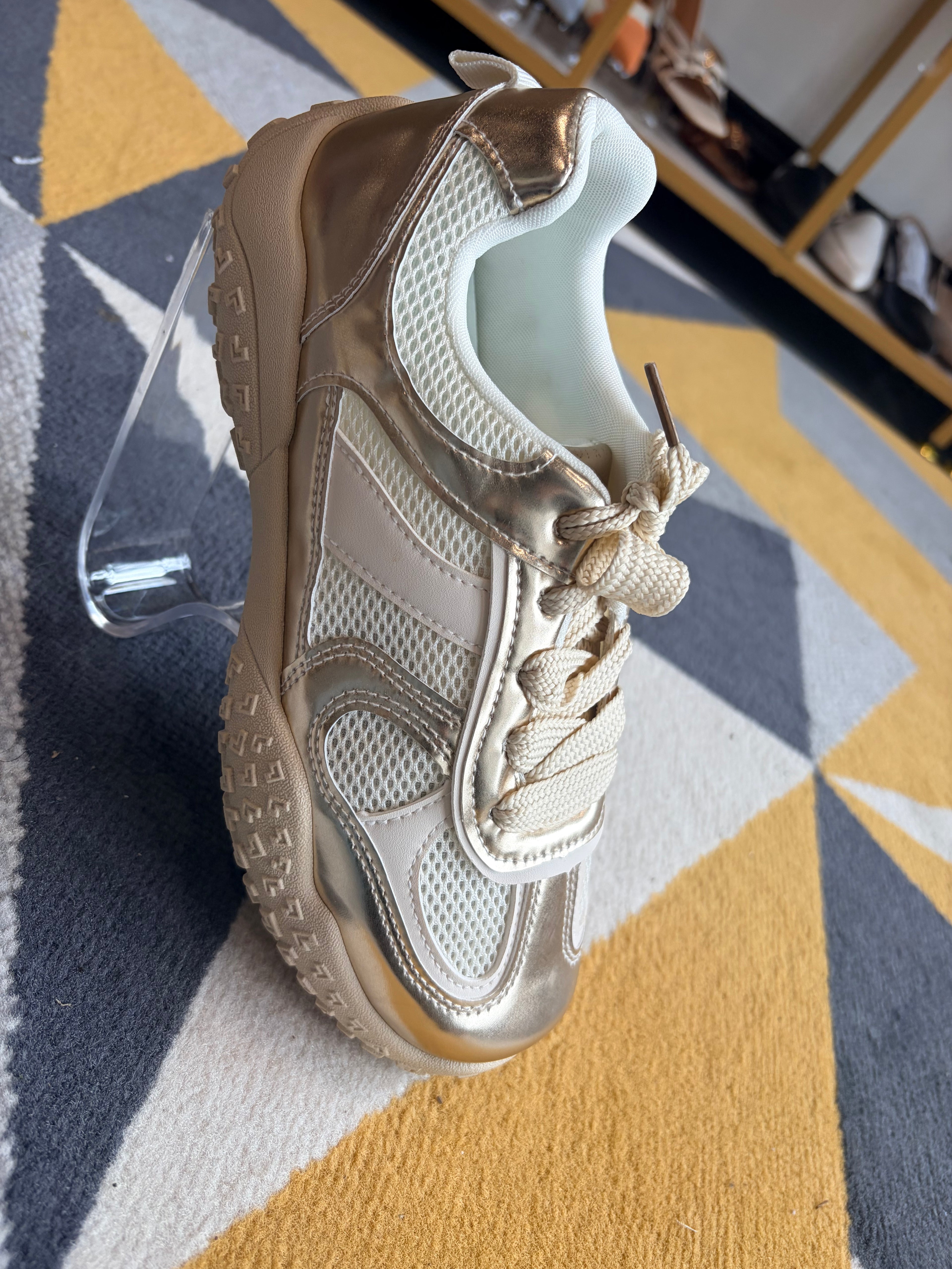 Gold and cream trainer