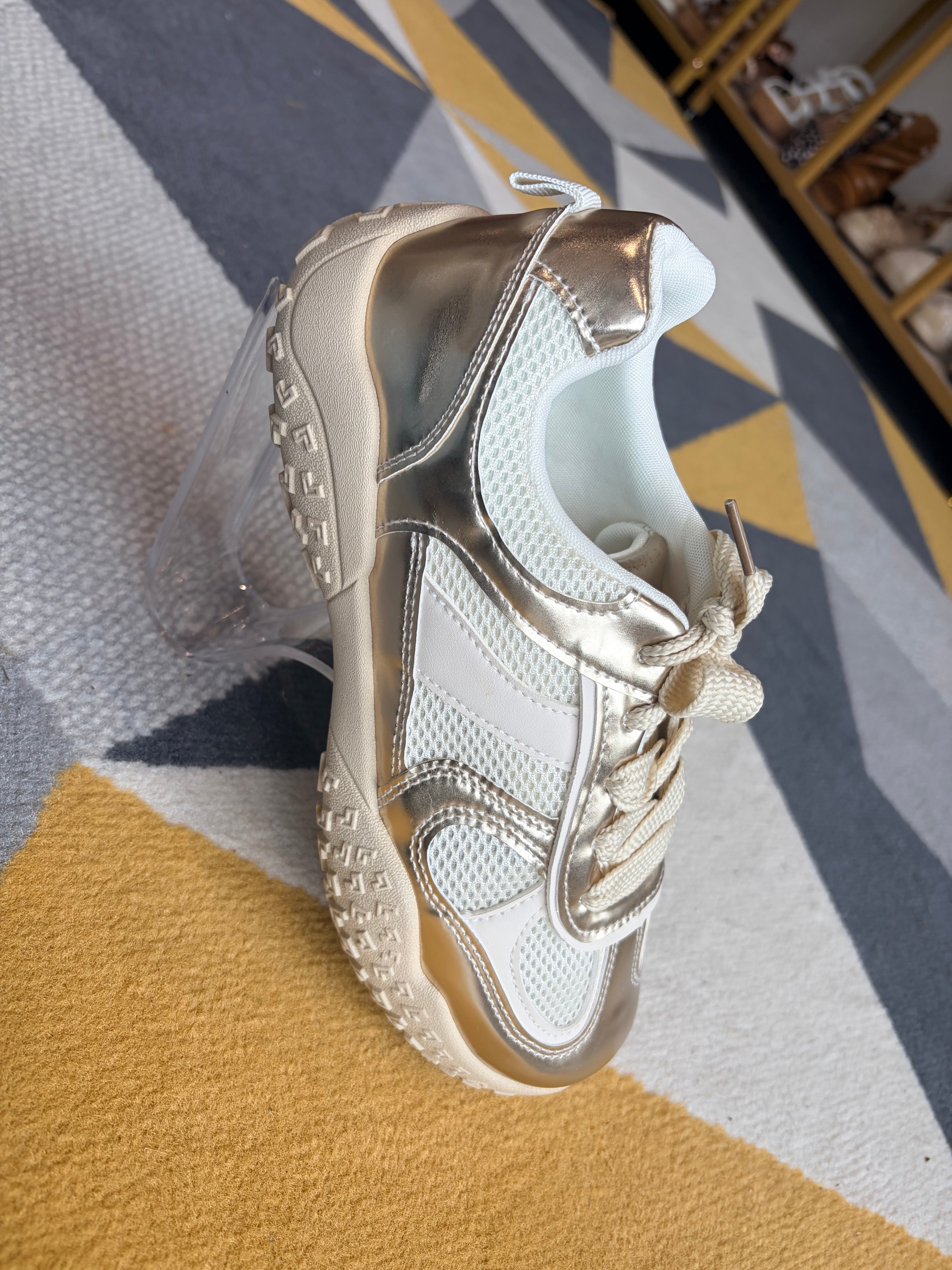 Gold and cream trainer
