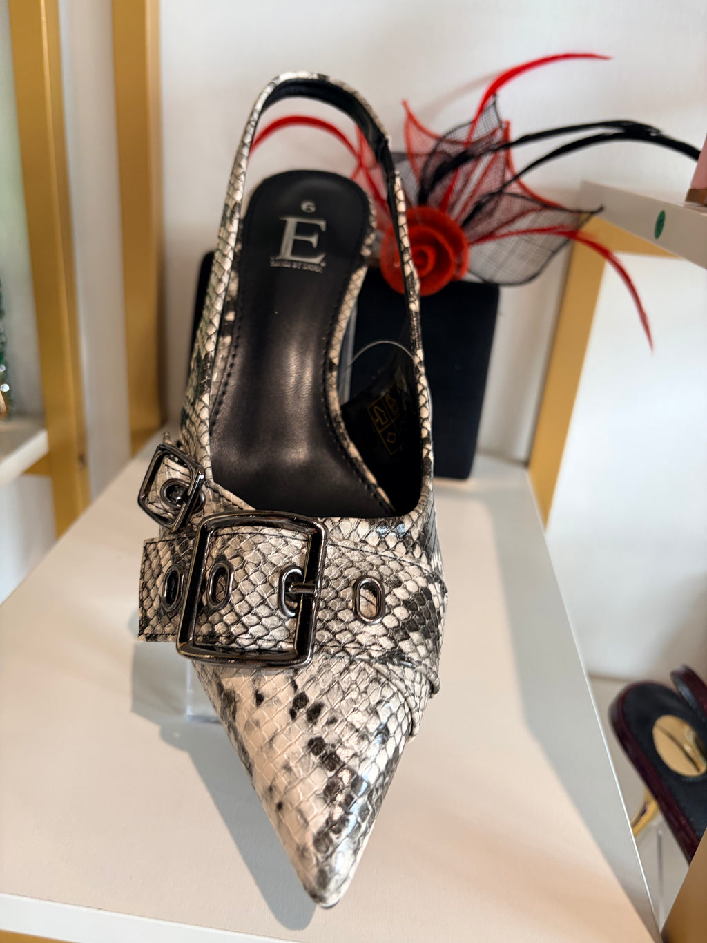 Snake Buckle leather Sling back shoes.