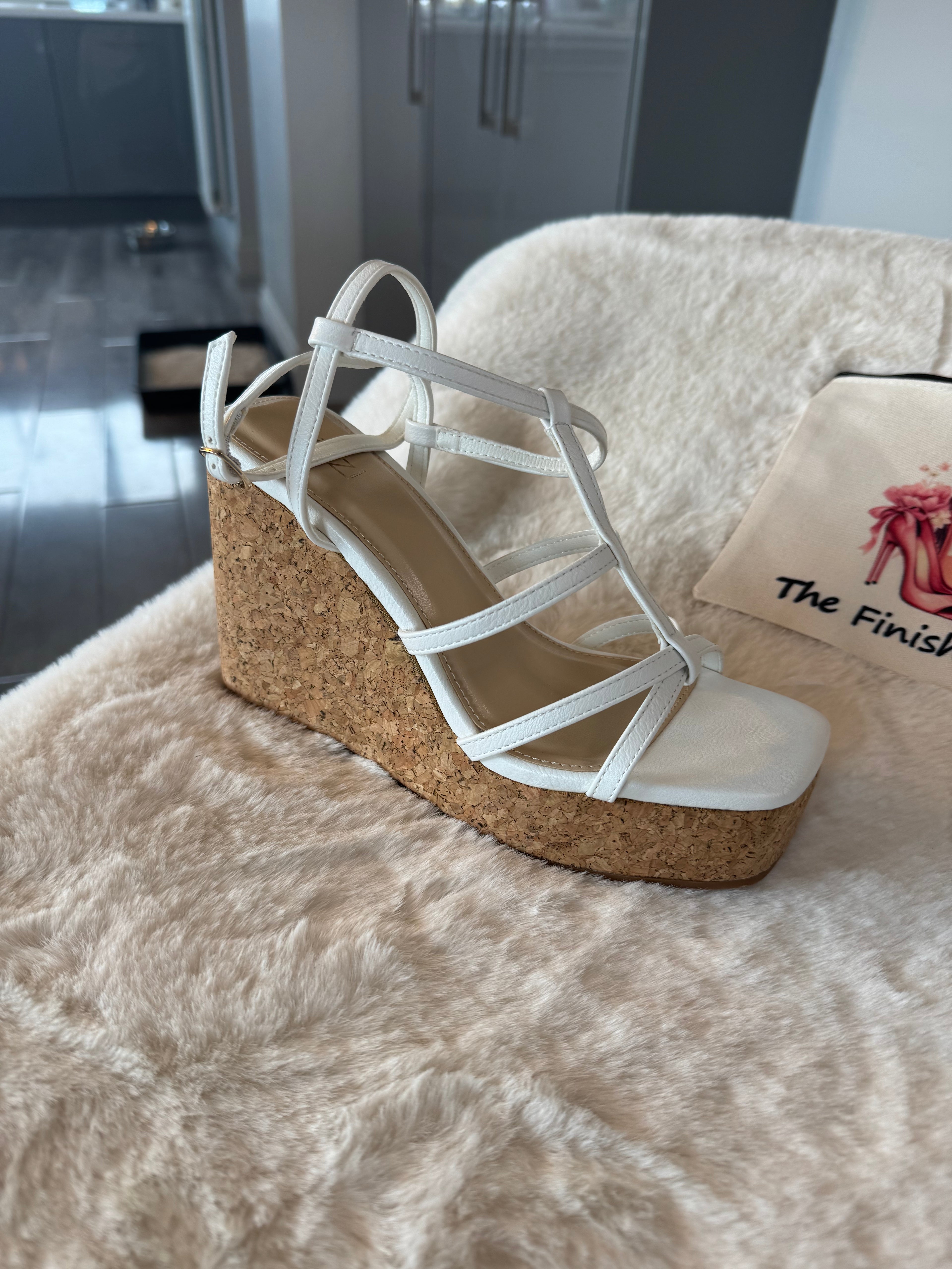 Strappy wedge heel