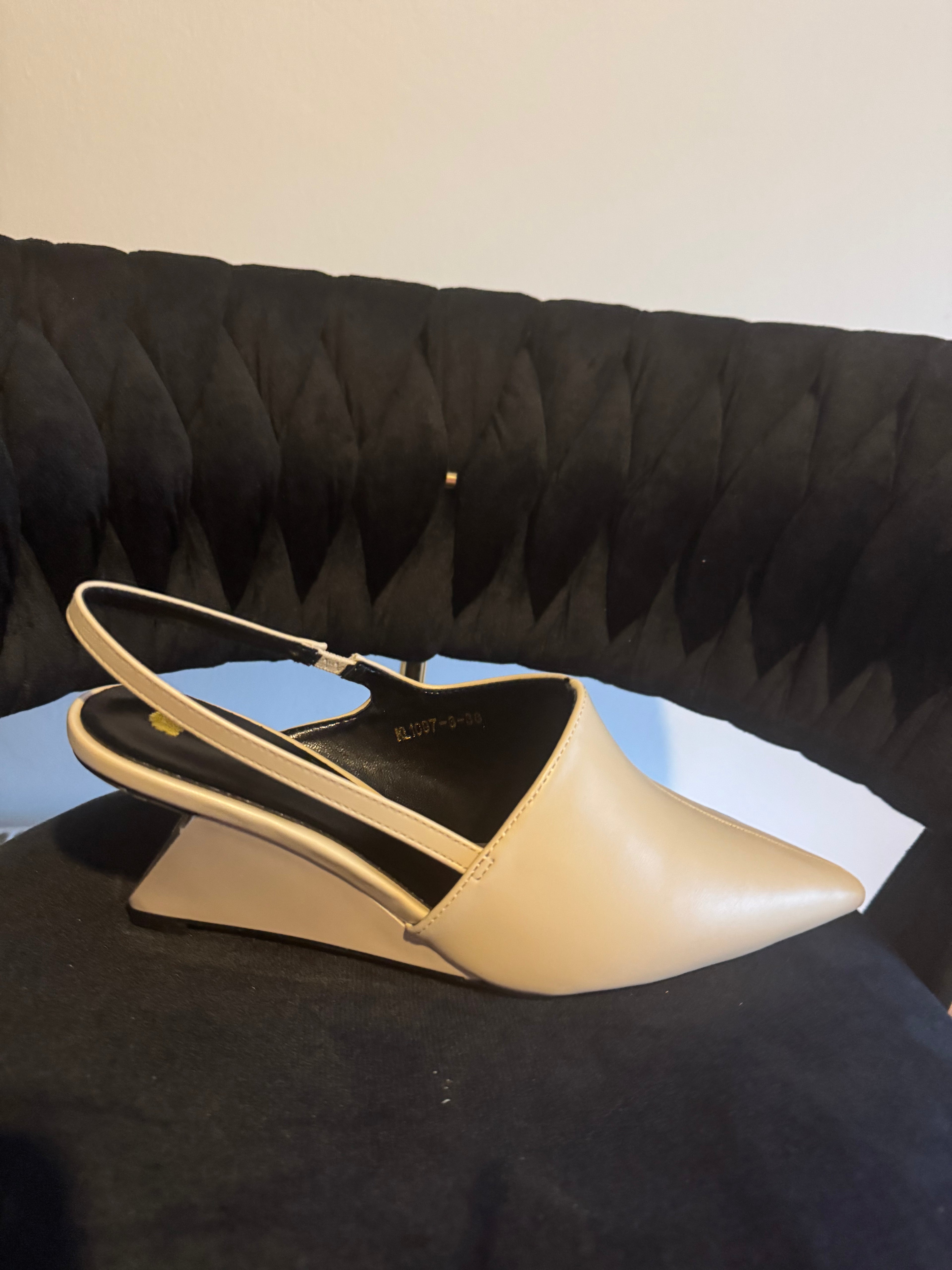 slingback wedge heeled shoe